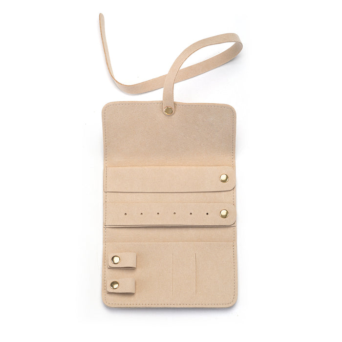Open view of the Weekend Journey Travel Jewelry Wrap Holder Tan, highlighting its versatile design with multiple storage options for jewelry. This elegant accessory supports your spiritual practices and embodies the meaning of significance, making it perfect for adventurers and those seeking spiritual connection.