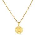 Gold chain necklace with round pendant featuring crescent moon and white crystal stones arranged in a circle.