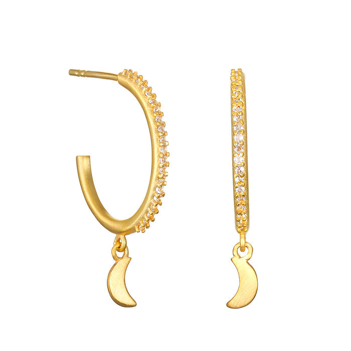 Gold-tone hoop earrings with crystal embellishments and crescent moon charm pendants.