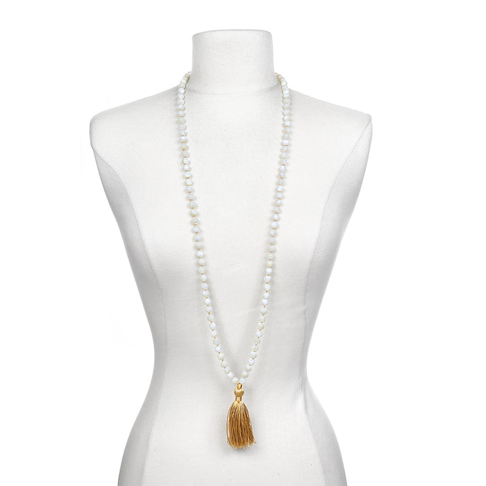 Wisdom Lotus Pearl Gemstone Mala on a mannequin, showcasing its unique design for spiritual jewelry, meditation, and personal meaning, acting as a talisman for protection and manifestation in your yoga journey.