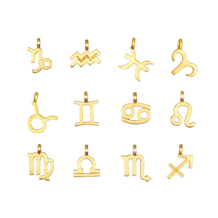 Zodiac Glyph Charm collection featuring 12 zodiac symbols in 18kt gold plate, perfect for spiritual jewelry and meditation. These talismans represent different zodiac signs, ideal for manifestation and meaningful connections during yoga practice.